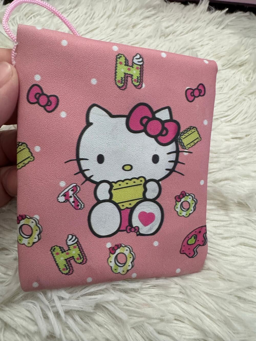 Hello Kitty pink crossbody white polka dots Hello Kitty holding a cake pink bow